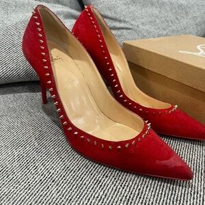 Red Christian Louboutin with spike design comes with the box!